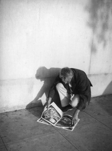 Herman Schultheis reads a map