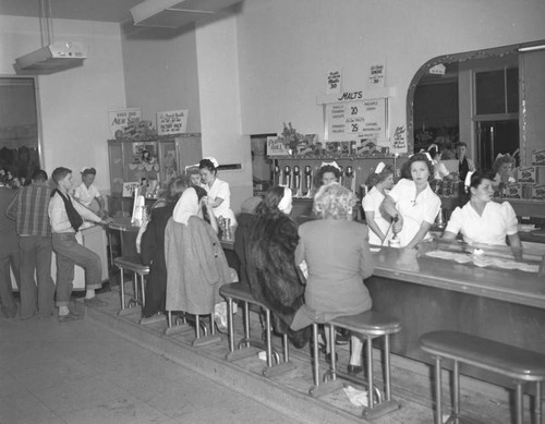 Customers at a Currie's Ice Cream store