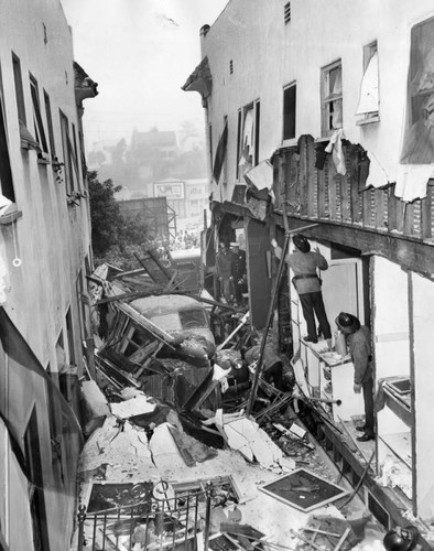 Blast tears wall off L. A. apartment house