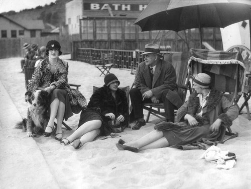 People relaxing outside the Gables Club