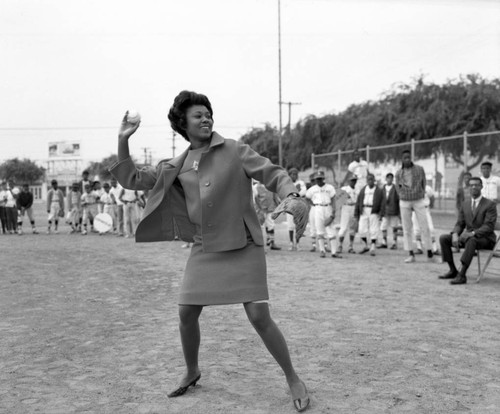 Yvonne Brathwaite Burke throws out a ceremonial opening pitch