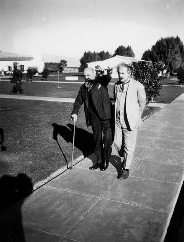 Albert Einstein with a colleague