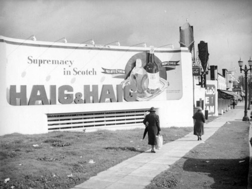 Haig and Haig billboard and Currie's Ice Cream on Beverly Boulevard