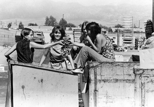 Manson Family in garbage bin