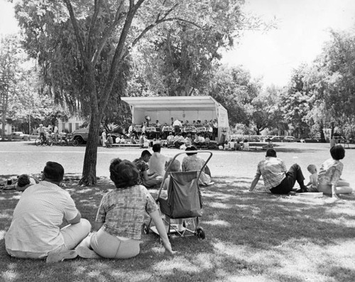 Valley residents listen and the band plays on