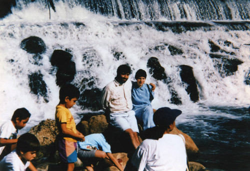 Arab American couple at waterfall