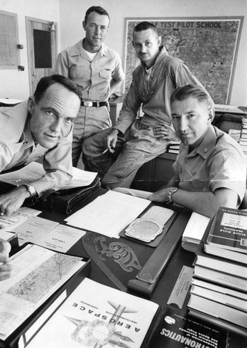 Four aerospace school students chat before class