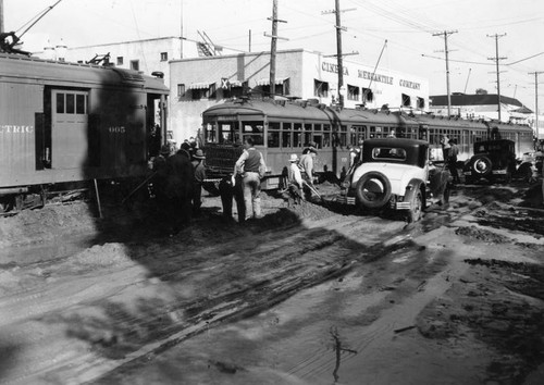 Streetcars stuck in mud