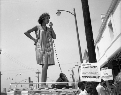 Demonstrators outside the Thriftimart