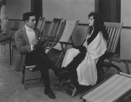 Sessue Hayakawa sitting