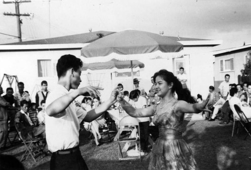 Dancing at a backyard party