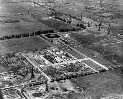 View of an oil company & wells