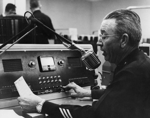 Policeman on the radio at Parker Center