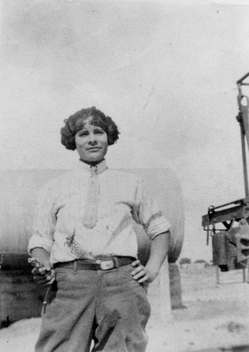 Mexican American woman with pistol