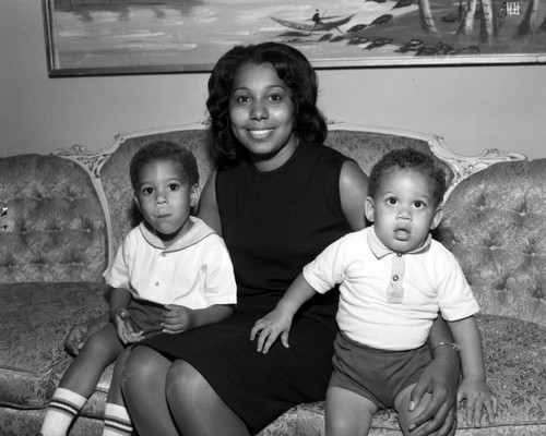 Unidentified woman and children