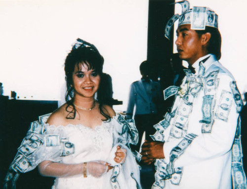 Traditional "money dance" at reception