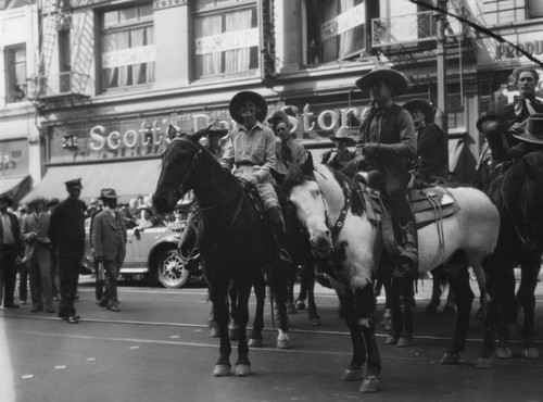 Parade participants greet crowds, view 6