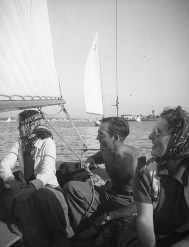 Ethel Schultheis and friends look away on a sailing trip