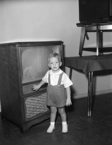 Small boy and TV set