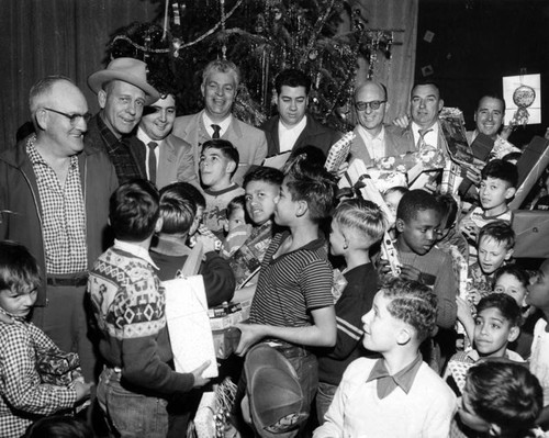 Rotarians give Santa an assist