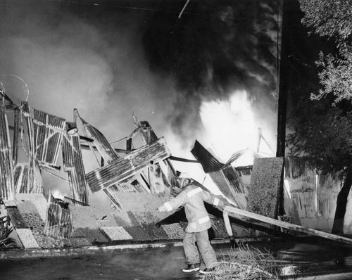 Fireman battles flames Sun Valley plant