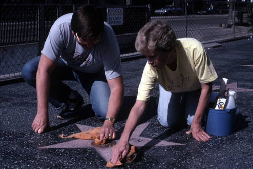 Cleaning a Walk of Fame star