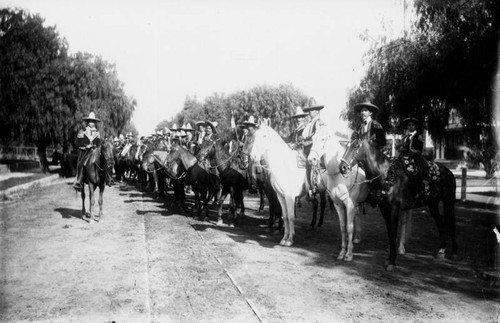 Mexican-Americans on horseback