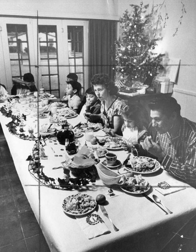 Homeless family enjoys Christmas dinner