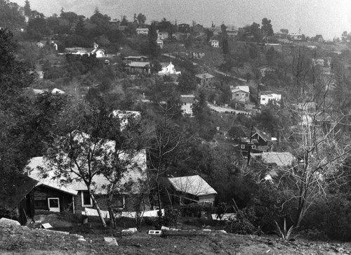 Weakened earth gives way in residential area