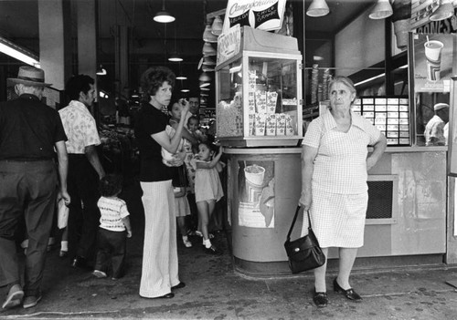 Shoppers near the popcorn stand at Grand Central