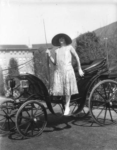 Woman and carriage at horse show