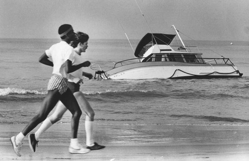 Beached cabin cruiser