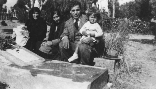 Family at gravesite