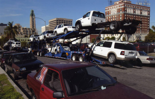 Car haulers on Sunset Place