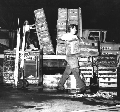 Loading vegetables at produce market