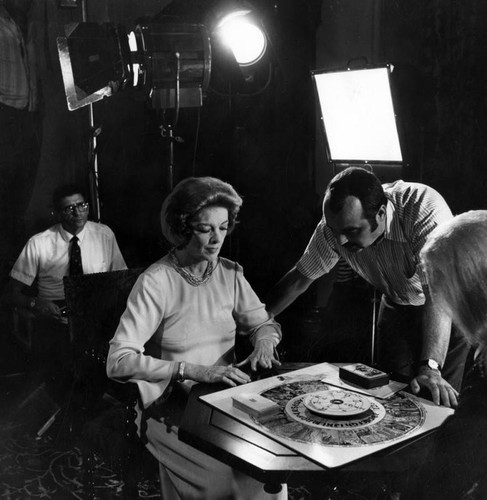 Myrna Loy on movie set