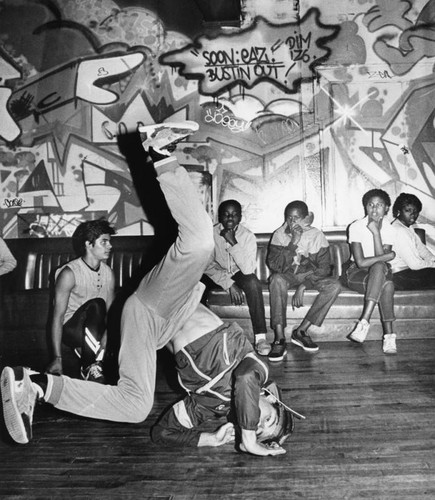 Showing off his breakdancing skills — Calisphere