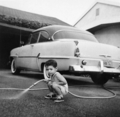 Boy in a driveway