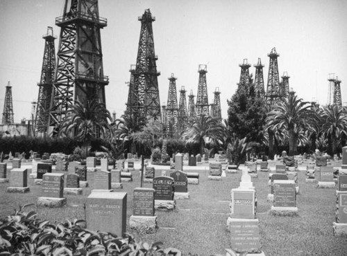 Graves and oil wells at Sunnyside Cemetery in Long Beach