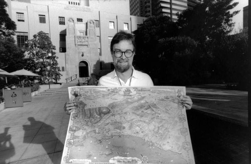 Glen Creason with map in front of LAPL