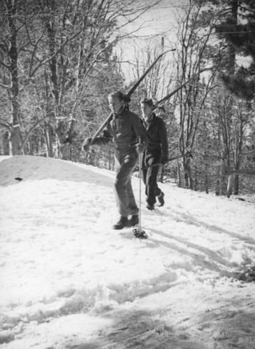 Big Pines Recreation Camp, skiers walking