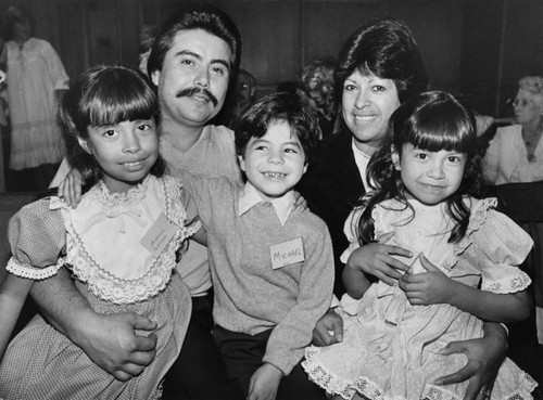 Newly adopted Michael Castellano with his family