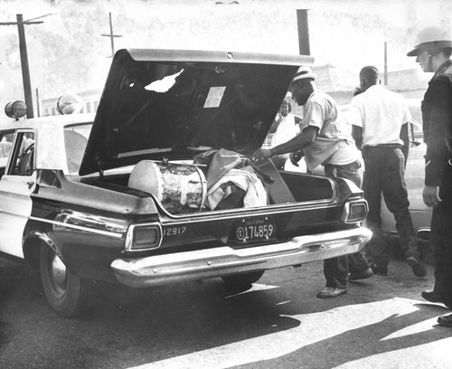 Police recover loot, Watts Riots