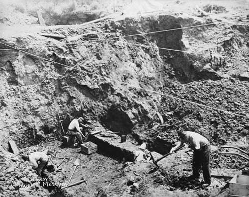 Men working in excavation pit