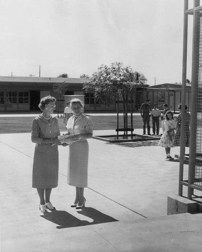 School officials Myrtle Hinssinger and principal Joan von KleinSmid