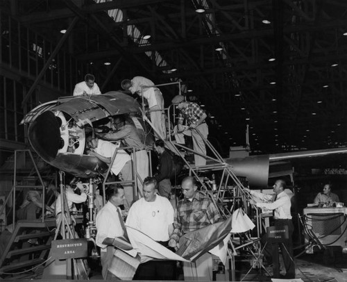 Workmen finishing Navy T2V-1 jet trainer