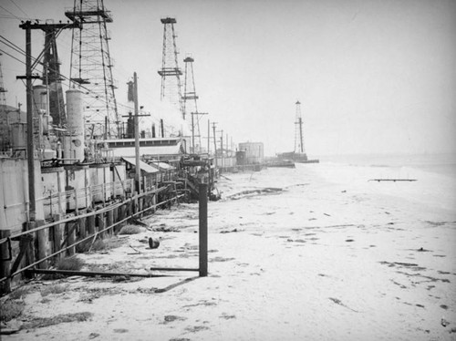 View of oil wells by the ocean