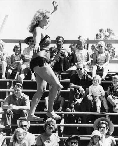 Tightrope walker performs for crowd