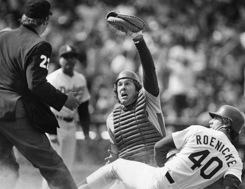 Gary Carter holds his glove up