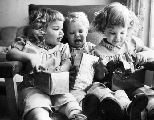 Triplets' birthday: chaos turns to joy